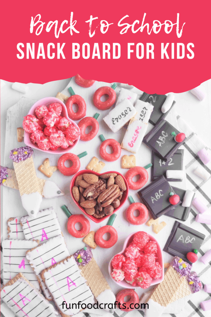 Back to school-themed sweet charcuterie board made of cookies, crackers and candies.