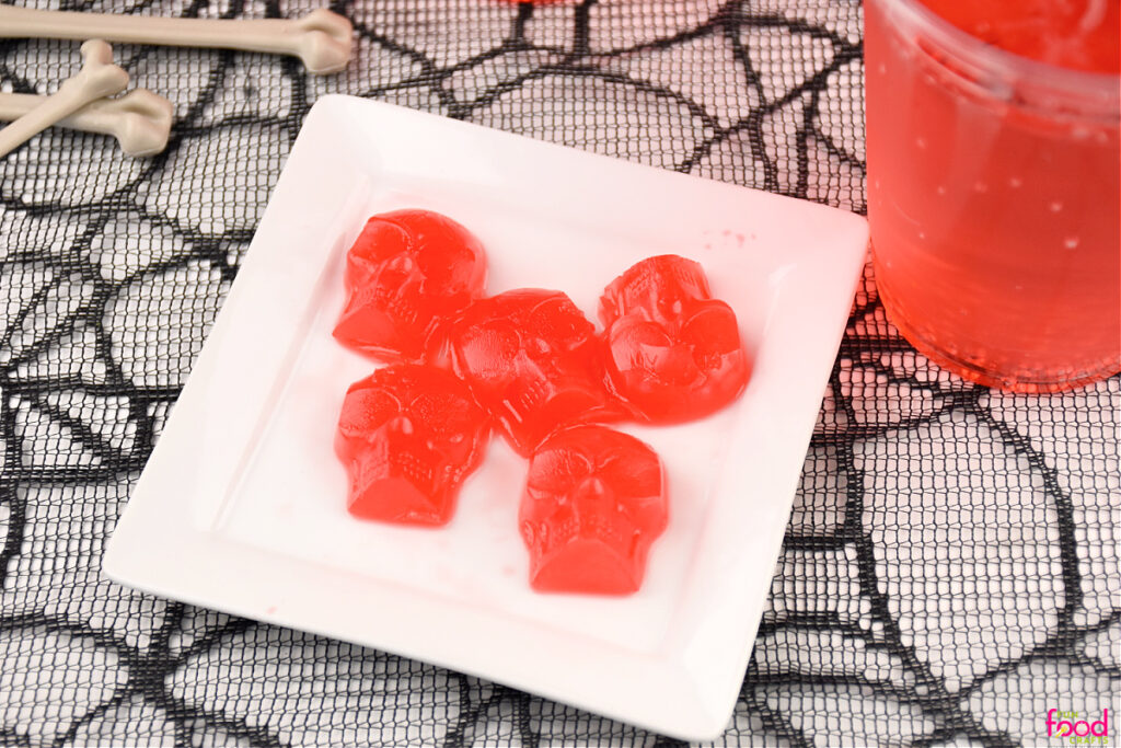 finished cherry ice skulls on a white plate