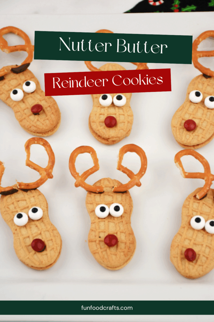 Close up of finished Nutter Butter Reindeer Christmas Cookies made using Nutter Butter cookies, pretzel antlers, and candy eyes and nose