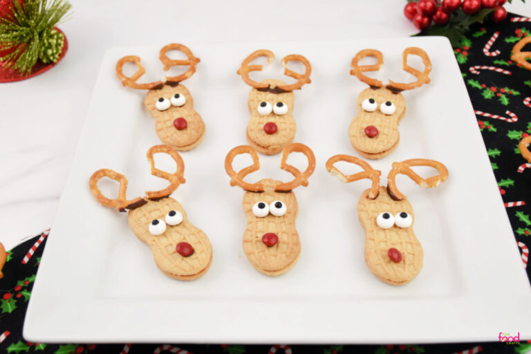 close up of Nutter Butter Reindeer cookies on a white plate