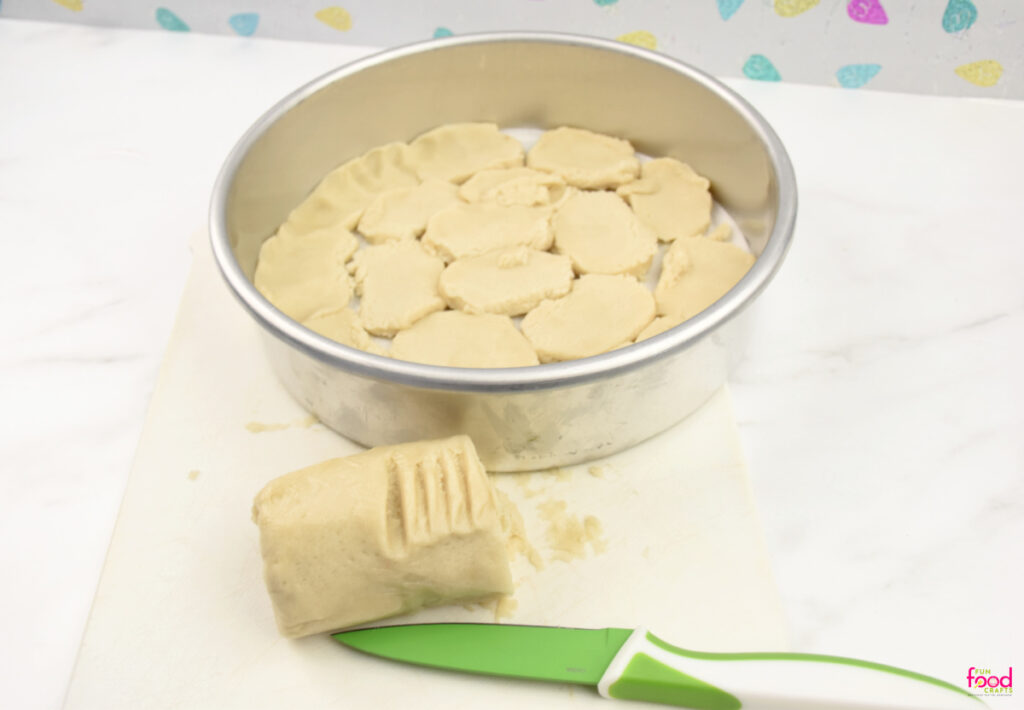 rounds of cookie dough placed together in round pan